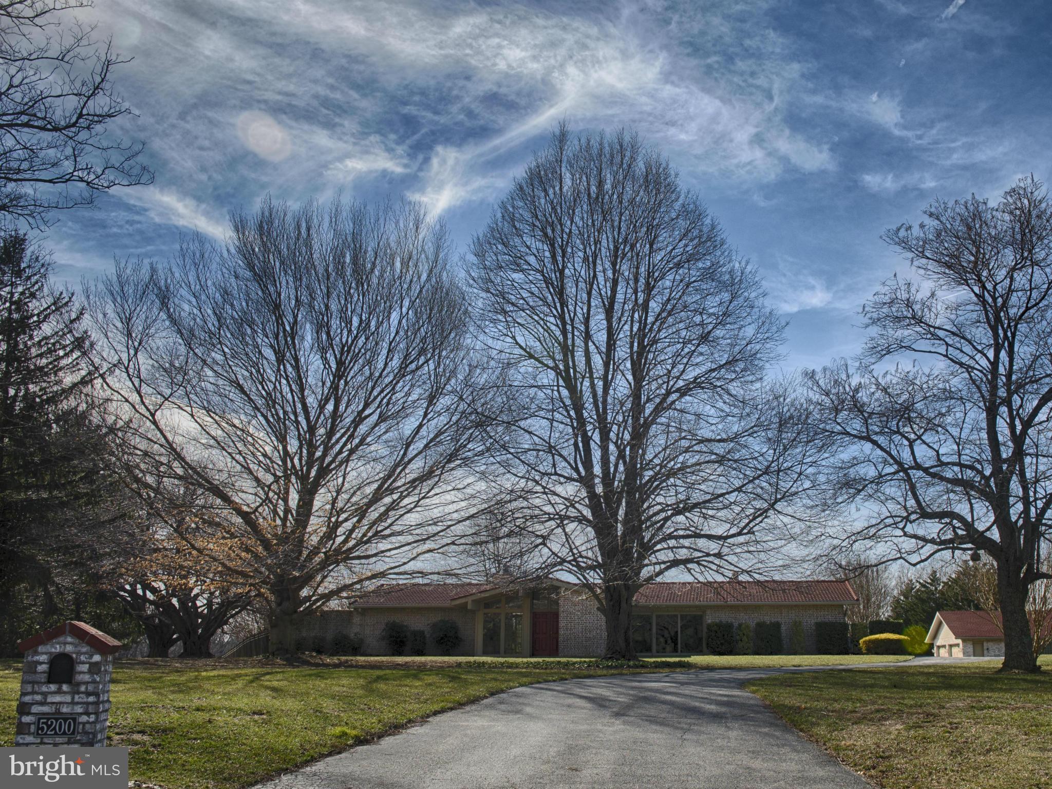 5200 Patterson Farm Road Baldwin, MD 21013 - Photo 2 of 30 a front view of a house with garden