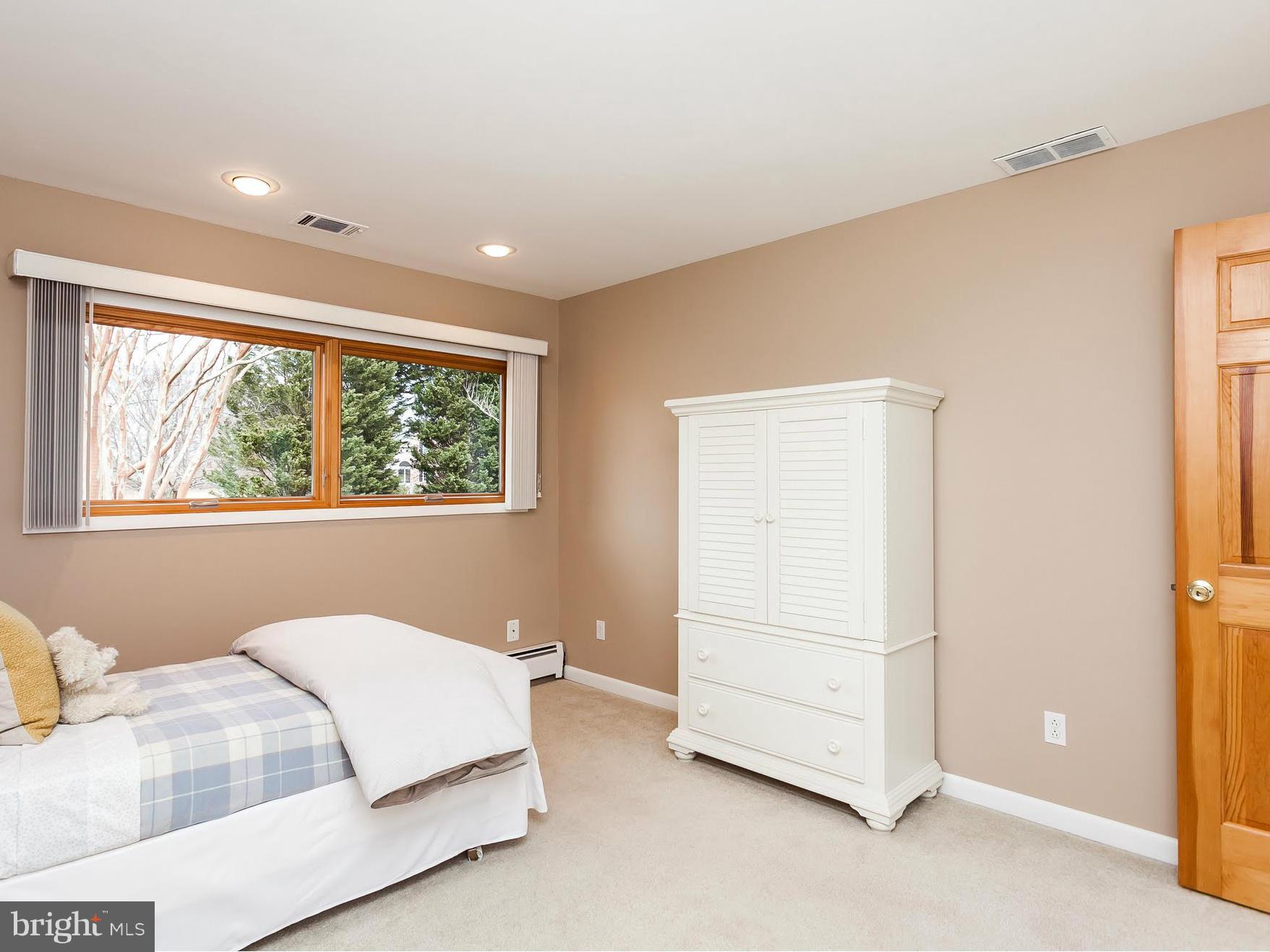 5200 Patterson Farm Road Baldwin, MD 21013 - Photo 14 of 30 a spacious bedroom with a bed and a window