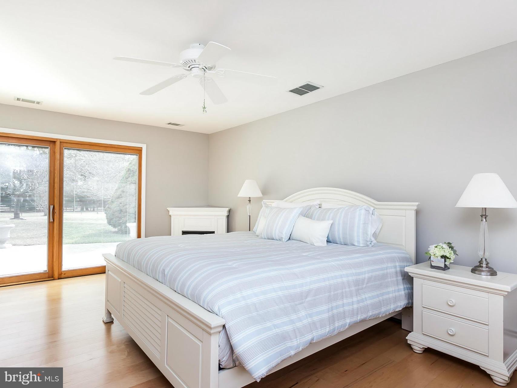 5200 Patterson Farm Road Baldwin, MD 21013 - Photo 19 of 30 a bedroom with a large bed and a large window