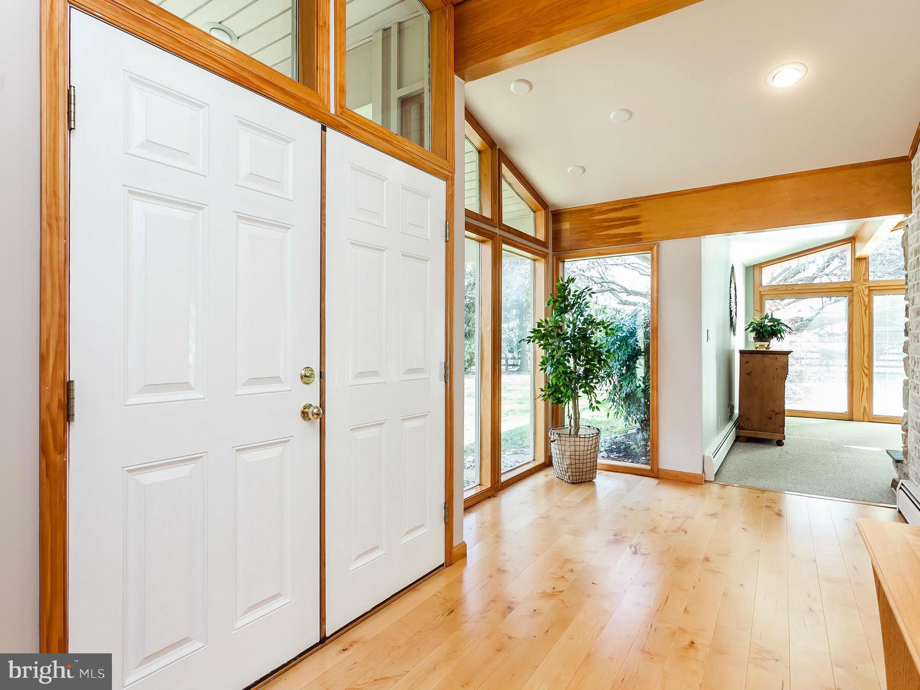 5200 Patterson Farm Road Baldwin, MD 21013 - Photo 3 of 30 a view of a hallway with wooden floor and a refrigerator