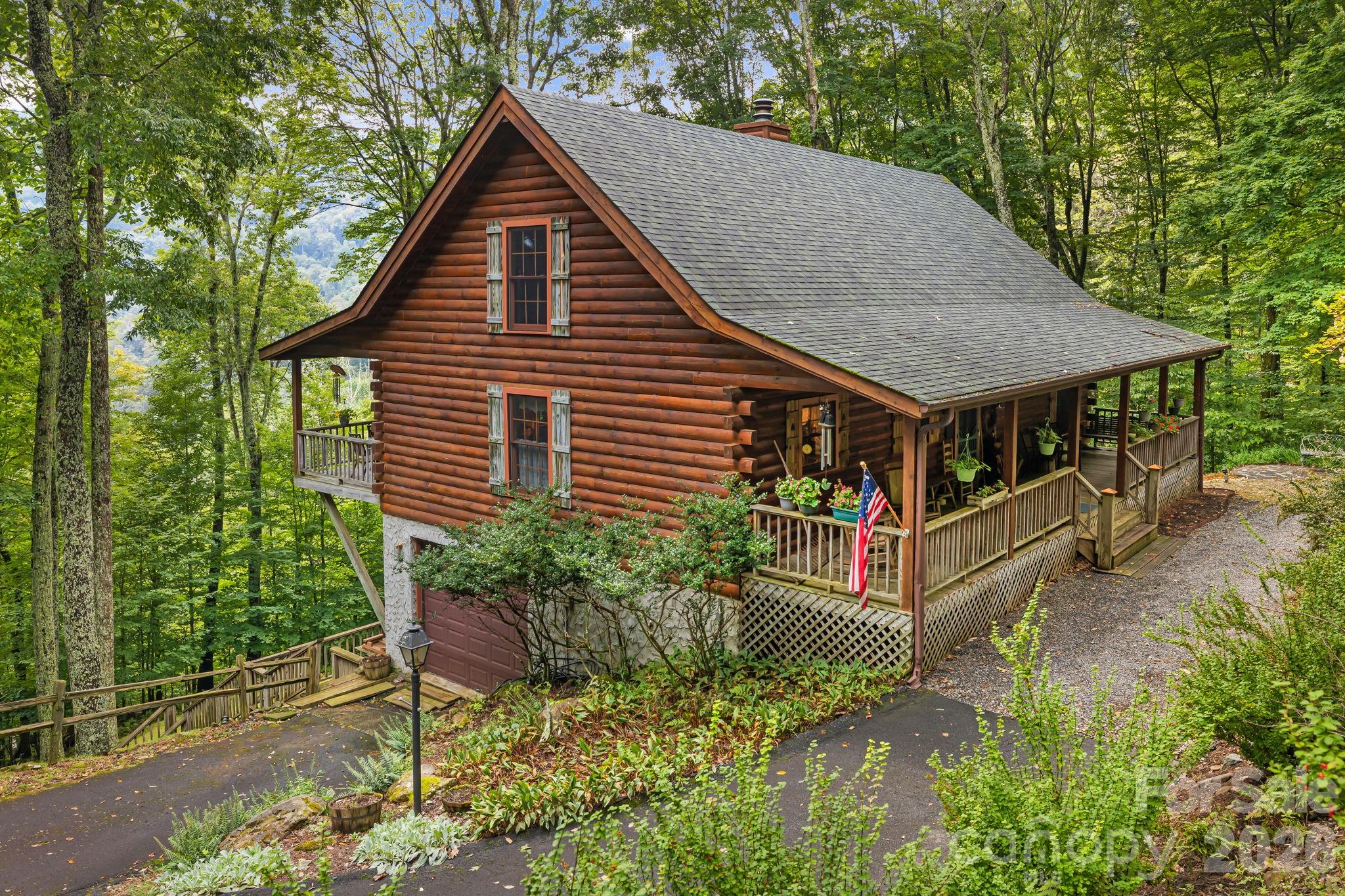 a aerial view of a house in a yard with plants