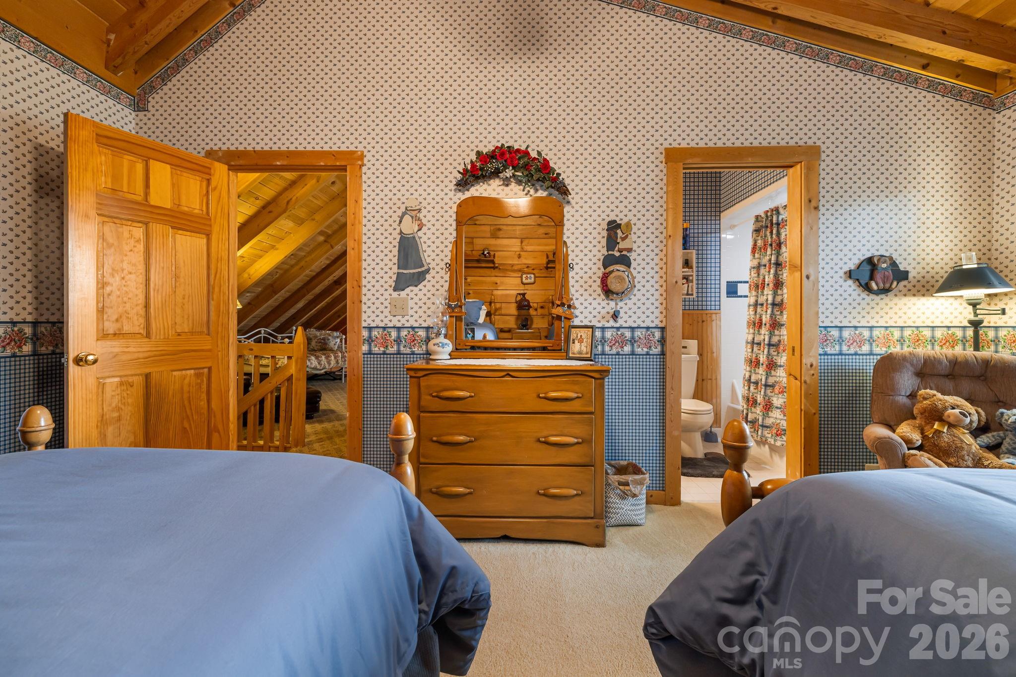 215 Goldenleaf Road Mars Hill, NC 28754 - Photo 28 of 47 a bedroom with a bed and a closet