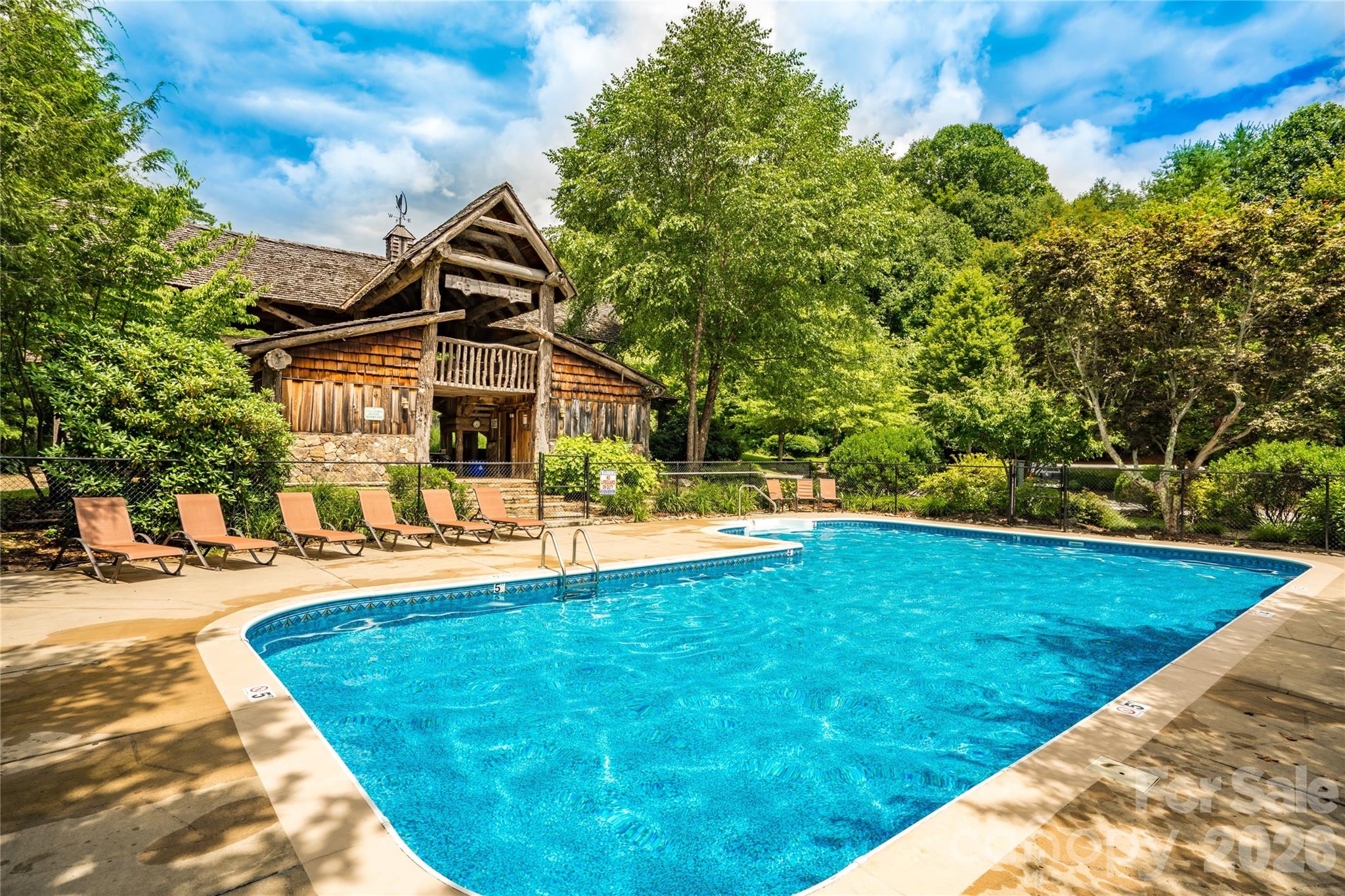 215 Goldenleaf Road Mars Hill, NC 28754 - Photo 40 of 47 a view of a house with swimming pool and sitting area