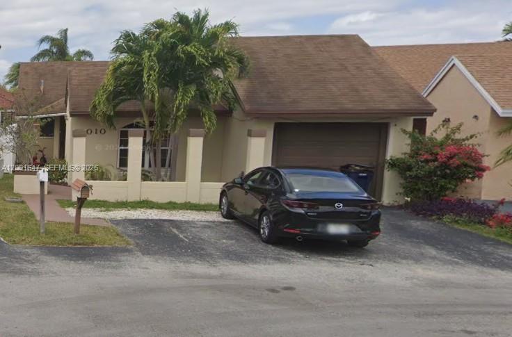 a car parked in front of a house