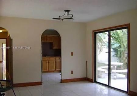 7010 Southwest 103rd Place Miami, FL 33173 - Photo 5 of 10 a view of empty room with front door