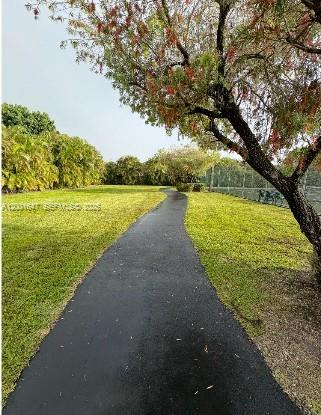 7010 Southwest 103rd Place Miami, FL 33173 - Photo 10 of 10 a view of a lake with a big yard