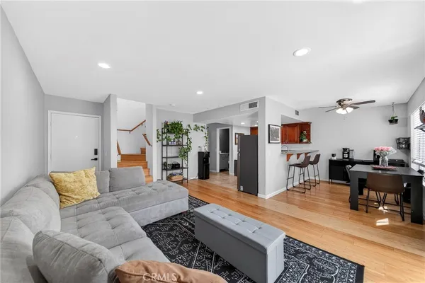 a living room with furniture and a table