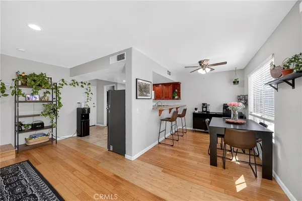 a view of a livingroom with furniture and a flat screen tv