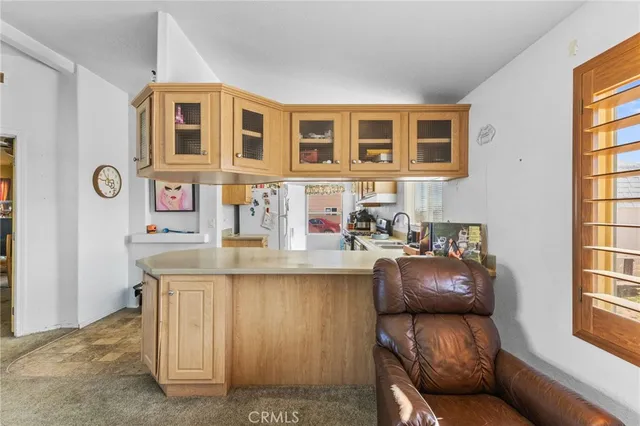 a living room with furniture and windows