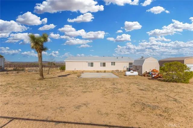 a view of a house with a snow