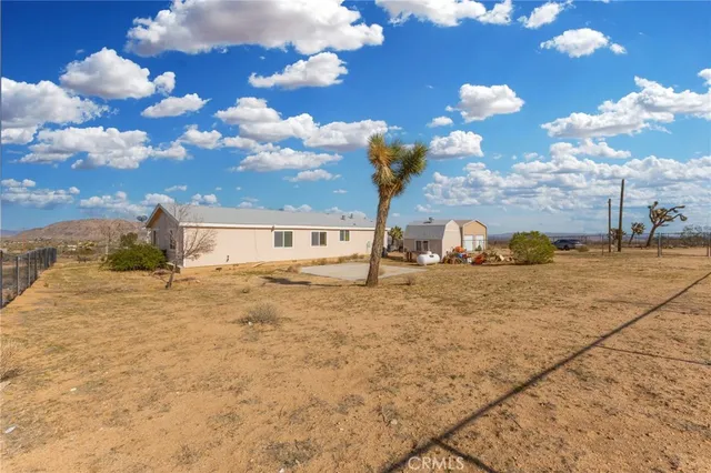 a view of a house with a snow