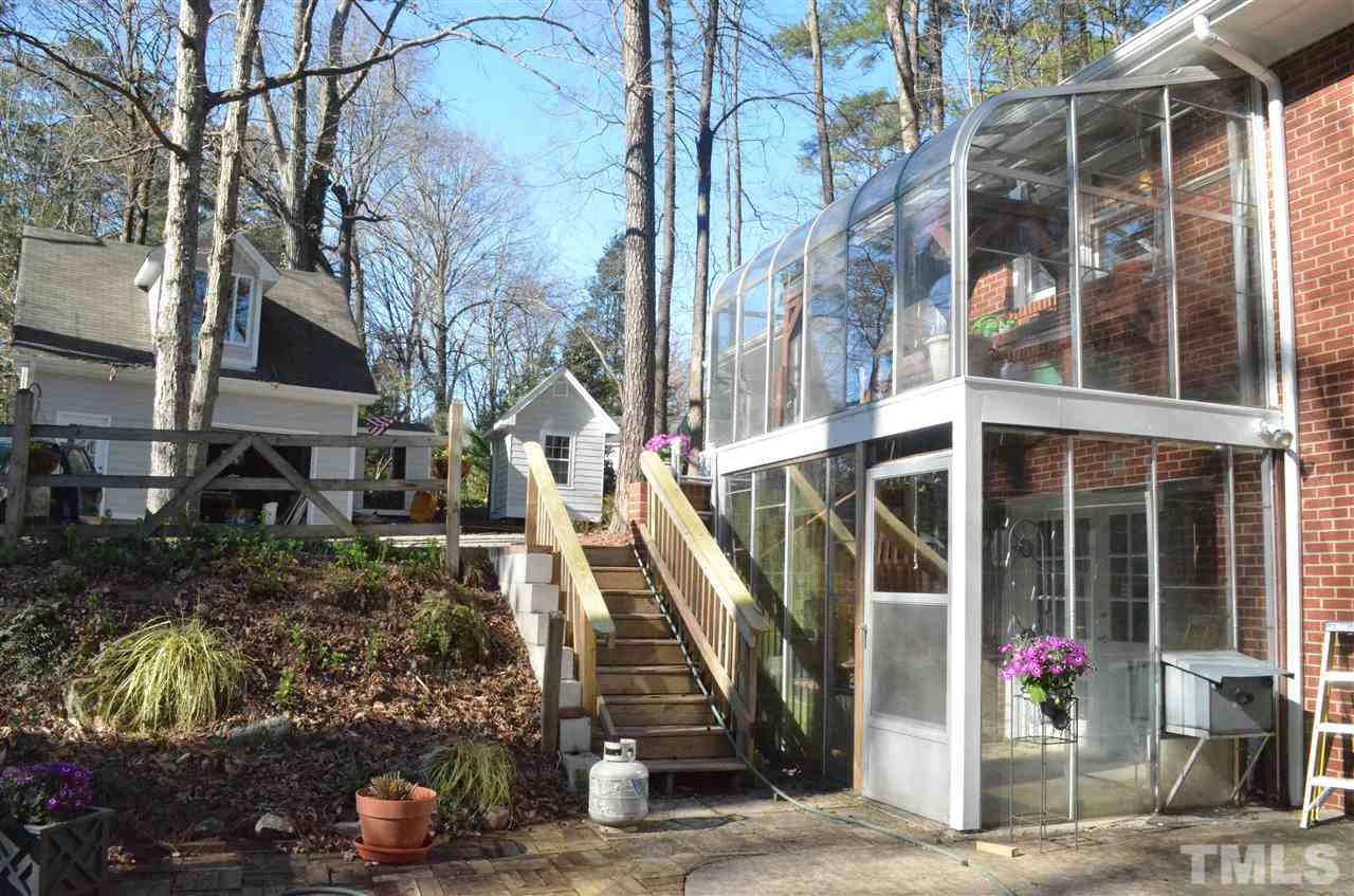 5311 Alpine Drive Raleigh, NC 27609 - Photo 20 of 25 a front view of a building with street view