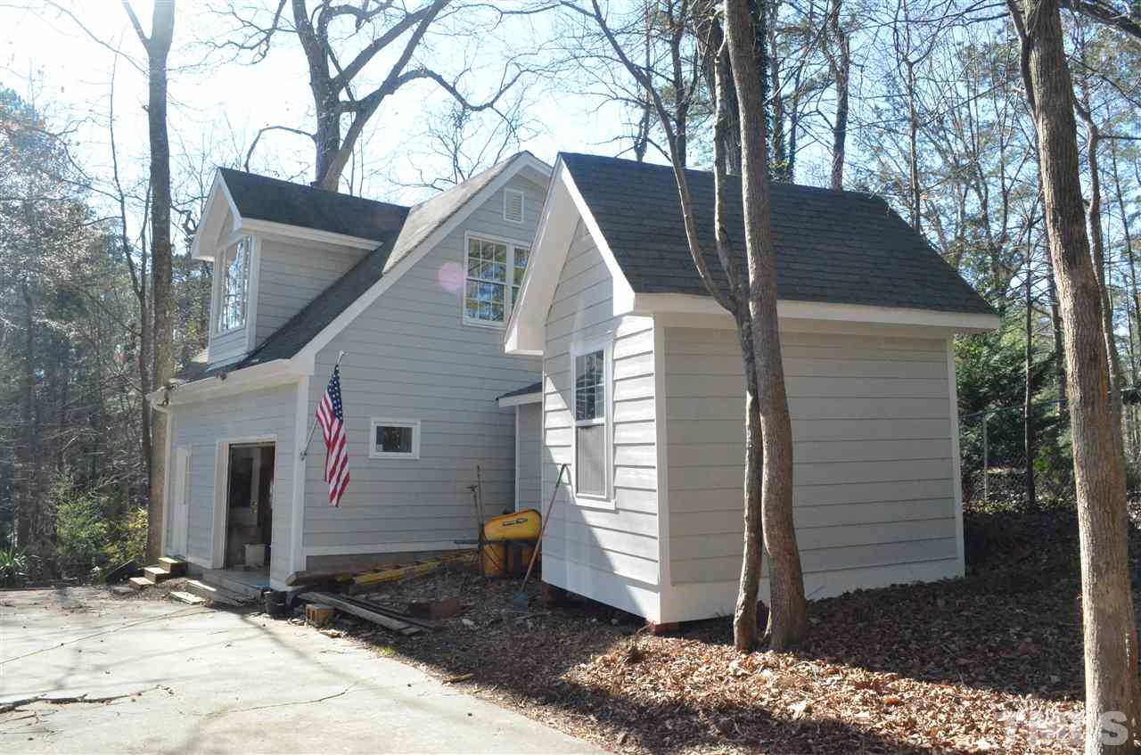 5311 Alpine Drive Raleigh, NC 27609 - Photo 23 of 25 a view of a house with a yard