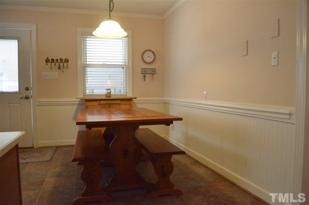 5311 Alpine Drive Raleigh, NC 27609 - Photo 8 of 25 a workspace with furniture and window
