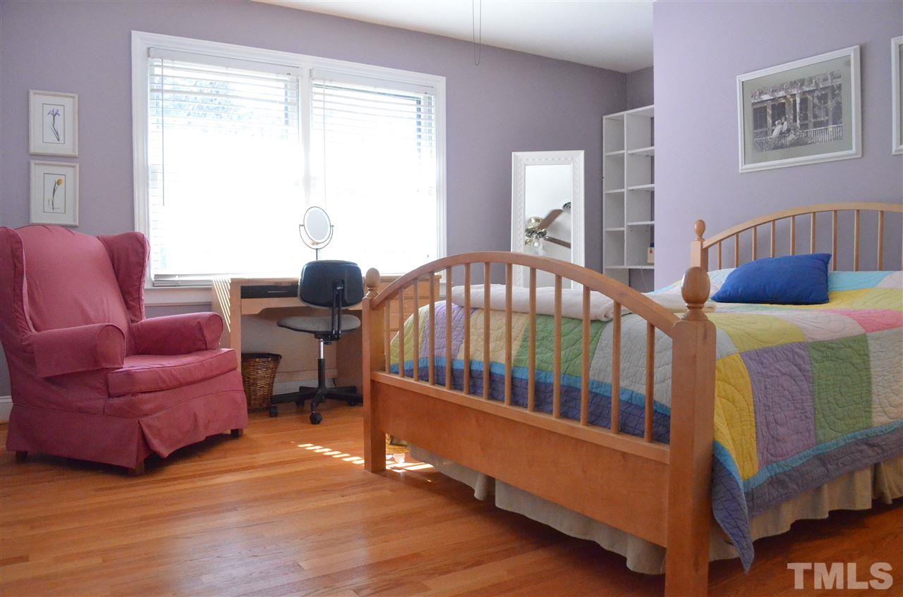 5311 Alpine Drive Raleigh, NC 27609 - Photo 10 of 25 a bedroom with furniture and a window