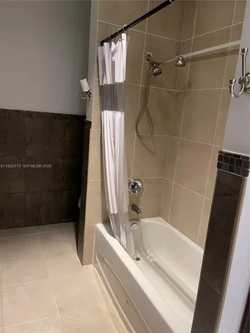 a bathroom with a bathtub
