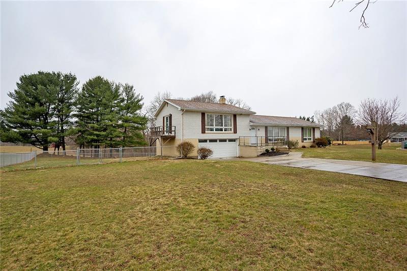 16 Emery Road Fredericktown, PA 15333 - Photo 2 of 25 Side view of the home.