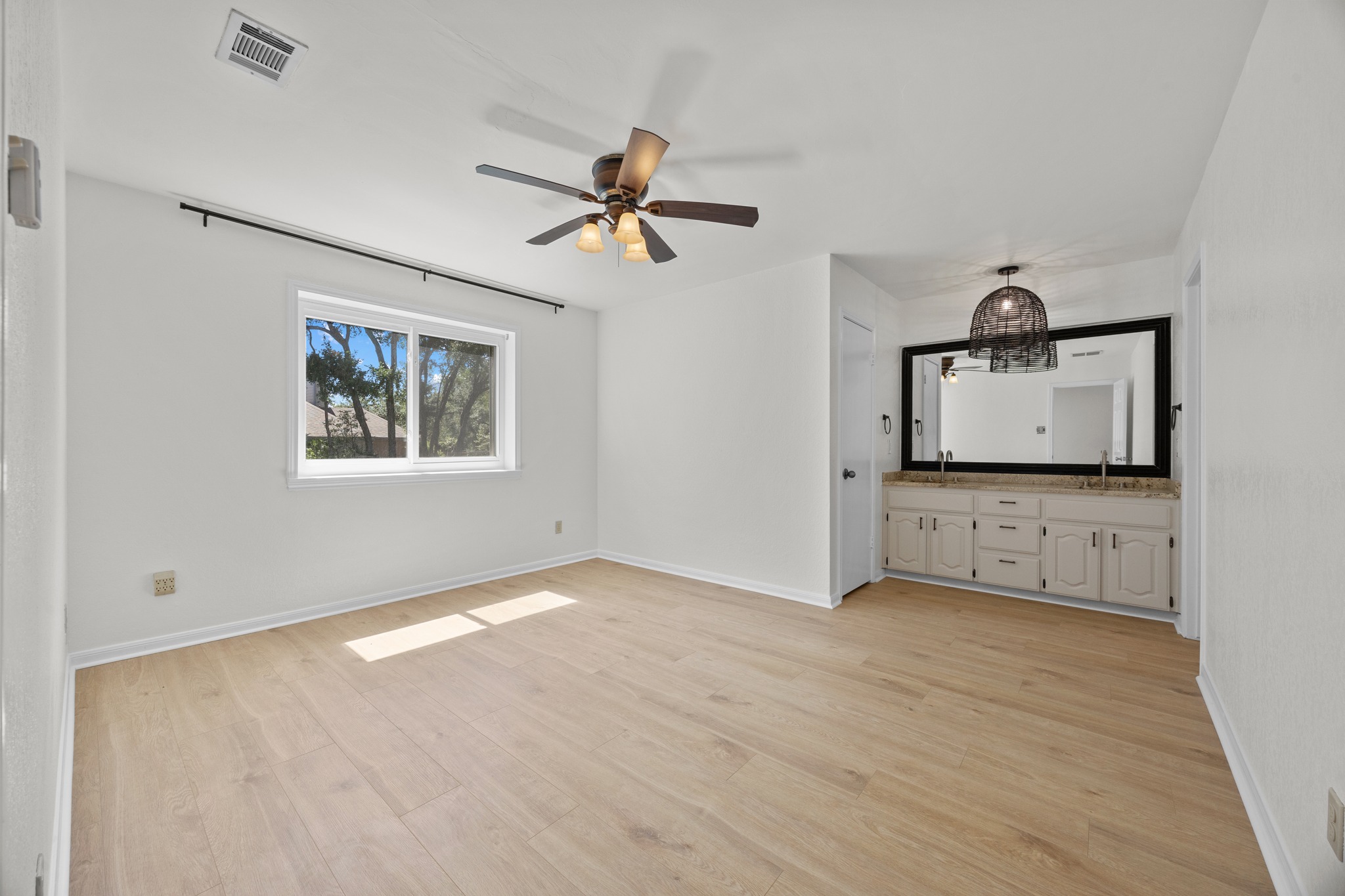 11019 Southwest Oaks Austin, TX 78737 - Photo 17 of 39 Updated in 2026, the primary features a beautiful ensuite.