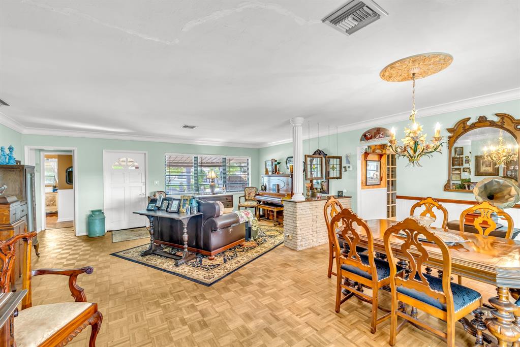1931 Northeast 27th Street Lighthouse Point, FL 33064 - Photo 15 of 28 a living room with furniture and a large window