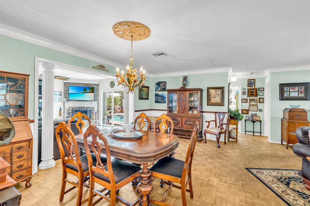 1931 Northeast 27th Street Lighthouse Point, FL 33064 - Photo 16 of 28 a view of a dining room with furniture