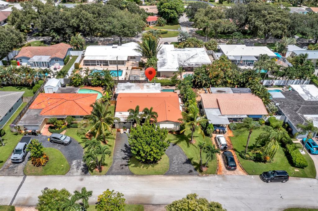 1931 Northeast 27th Street Lighthouse Point, FL 33064 - Photo 2 of 28 an aerial view of residential houses with outdoor space