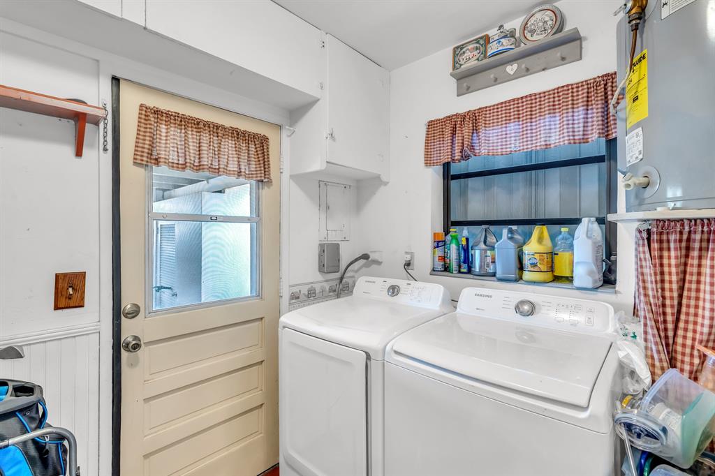 1931 Northeast 27th Street Lighthouse Point, FL 33064 - Photo 28 of 28 a utility room with dryer and washer