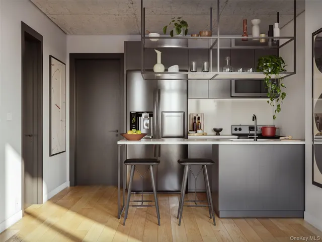 a kitchen with a table and chairs