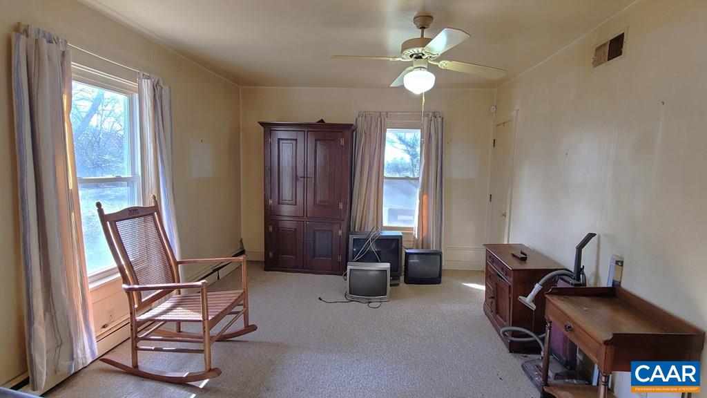 3689 Ranson Road Dillwyn, VA 23936 - Photo 13 of 51 a view of a workspace with furniture and a window