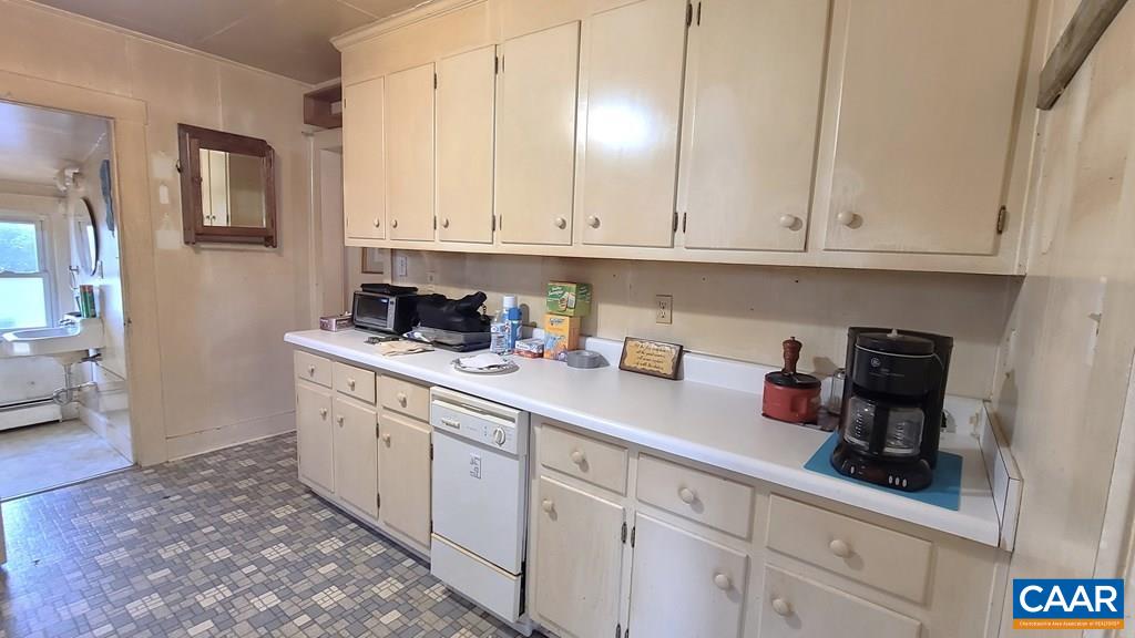 3689 Ranson Road Dillwyn, VA 23936 - Photo 18 of 51 a kitchen with white cabinets and sink