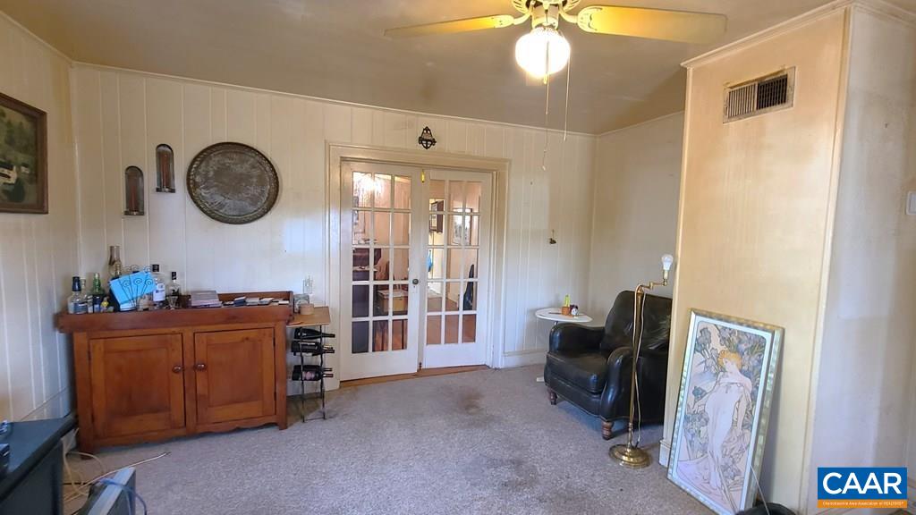 3689 Ranson Road Dillwyn, VA 23936 - Photo 20 of 51 a living room with furniture and a mirror