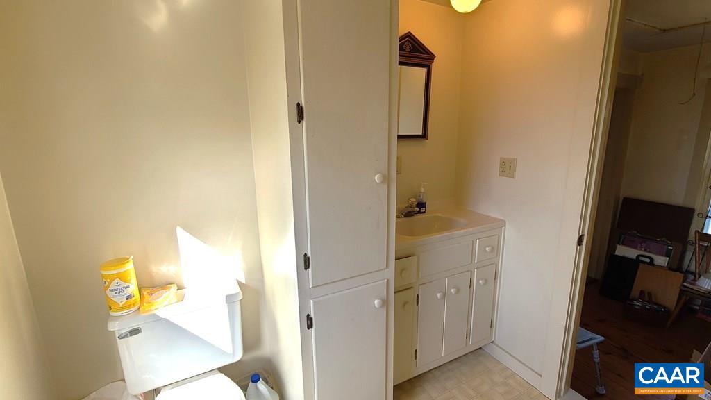 3689 Ranson Road Dillwyn, VA 23936 - Photo 22 of 51 a bathroom with a sink and a mirror