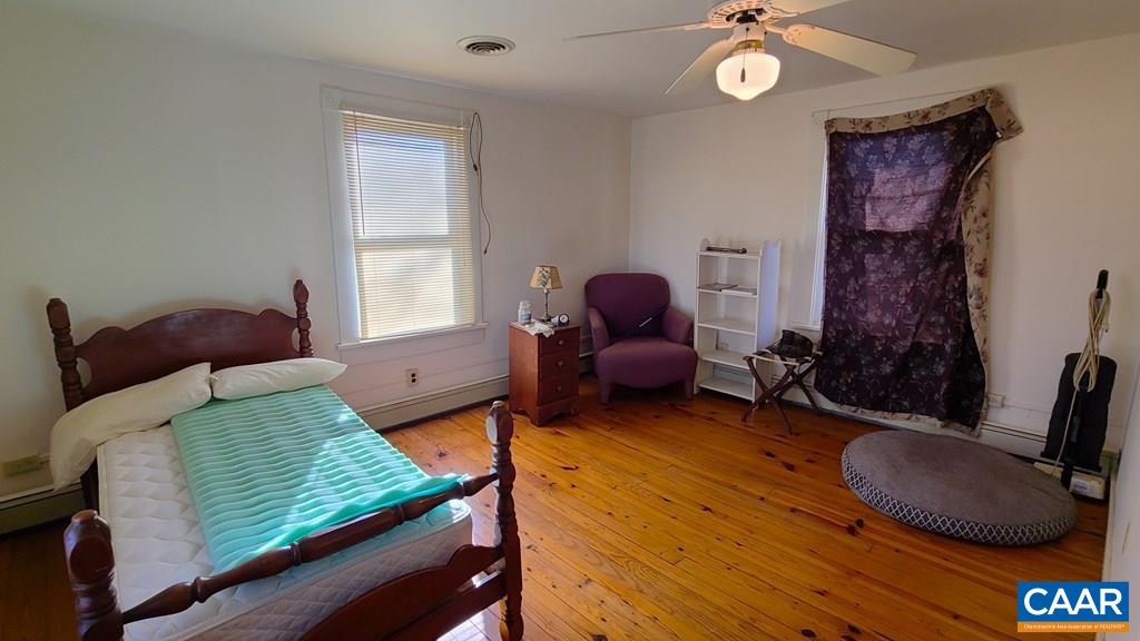 3689 Ranson Road Dillwyn, VA 23936 - Photo 27 of 51 a bedroom with furniture and a window