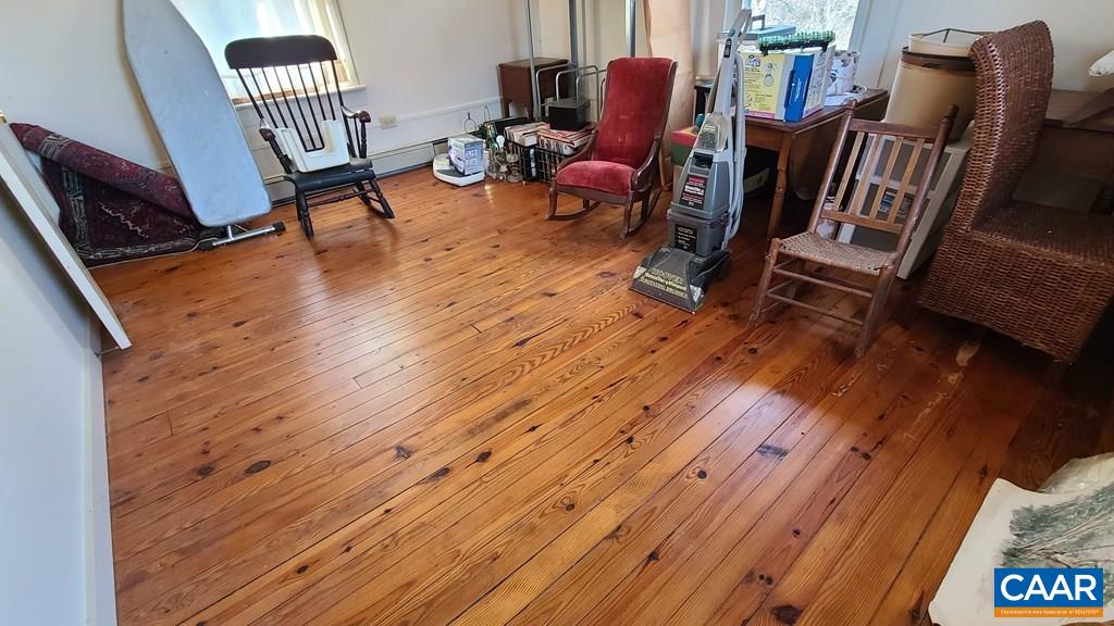 3689 Ranson Road Dillwyn, VA 23936 - Photo 28 of 51 a living room with furniture and a wooden floor
