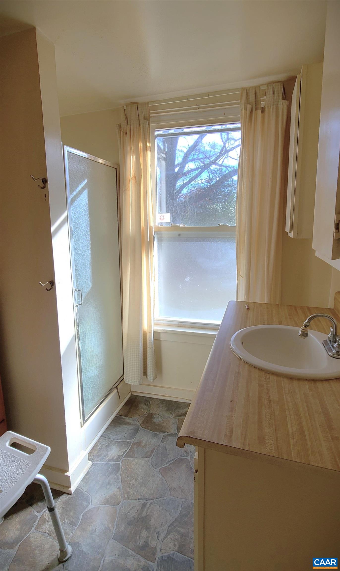 3689 Ranson Road Dillwyn, VA 23936 - Photo 30 of 51 a view of a bathroom with a sink and a tub