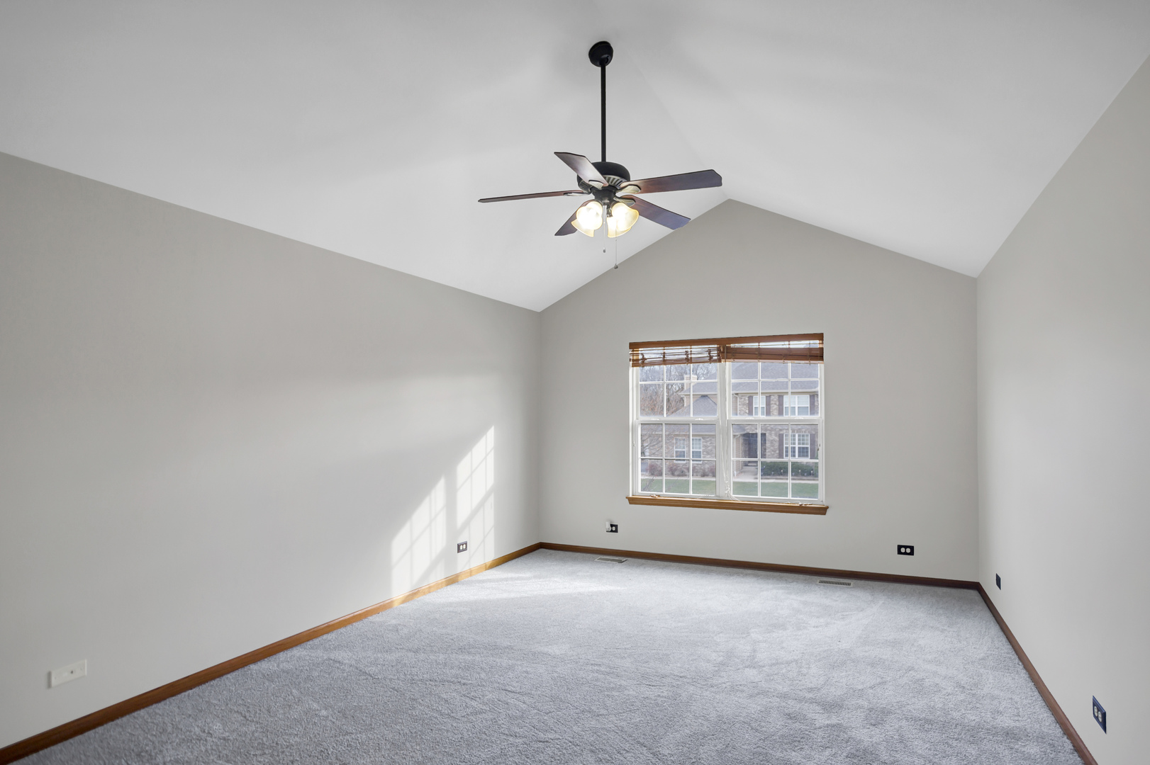 902 Oak Ridge Boulevard Elgin, IL 60120 - Photo 17 of 35 a view of an empty room with a window