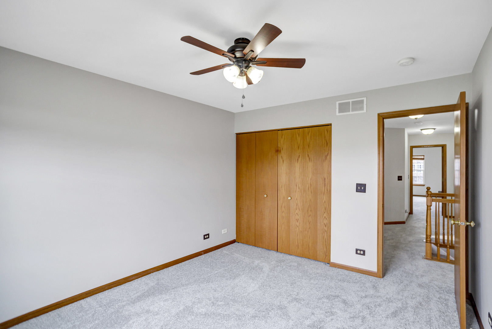 902 Oak Ridge Boulevard Elgin, IL 60120 - Photo 23 of 35 a view of an empty room with a ceiling fan
