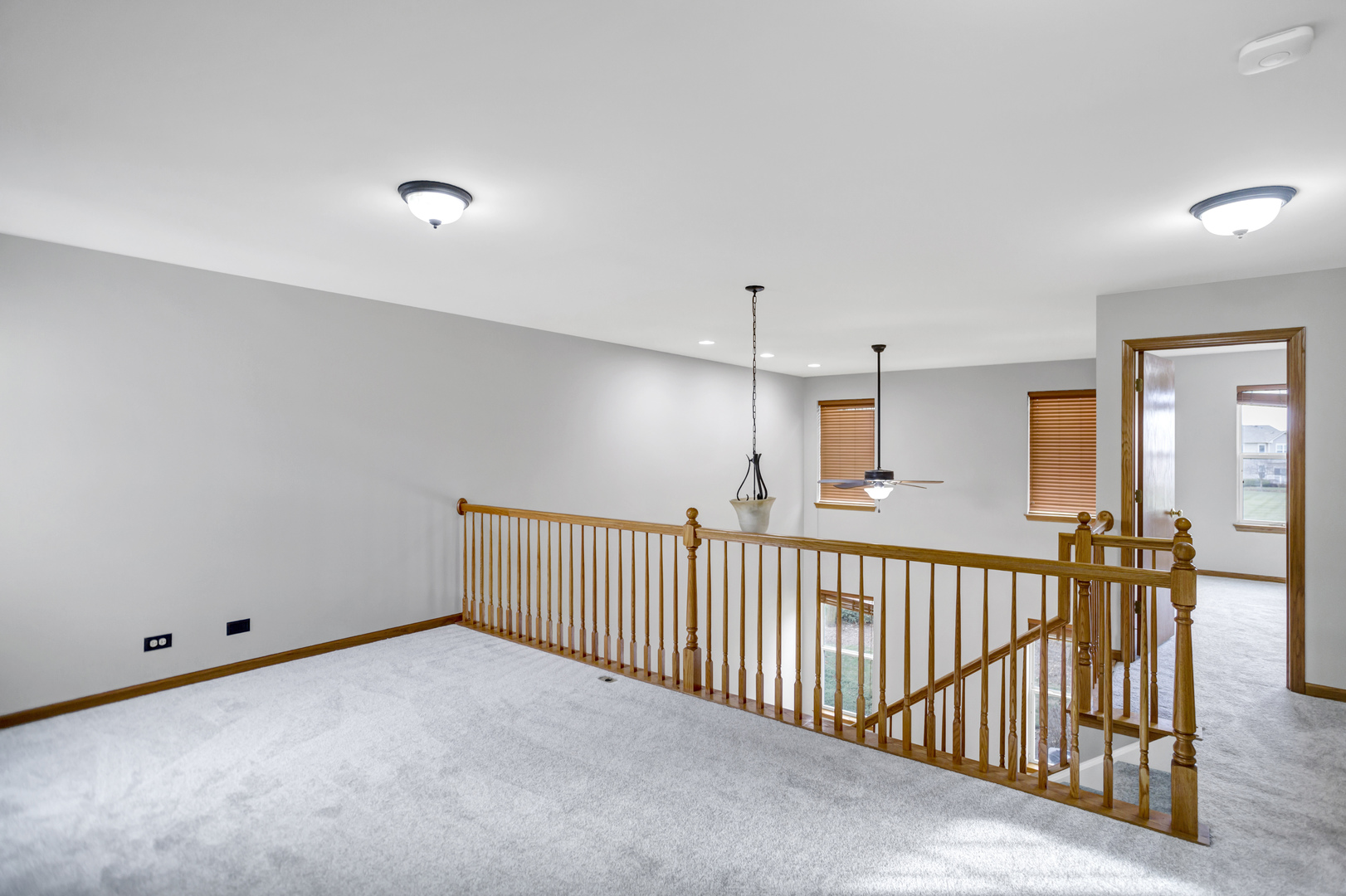 902 Oak Ridge Boulevard Elgin, IL 60120 - Photo 25 of 35 a view of a hallway with a window
