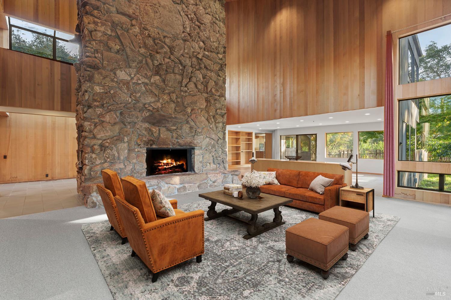 36029 Timber Ridge Road The Sea Ranch, CA 95497 - Photo 16 of 59 a living room with furniture and a fireplace