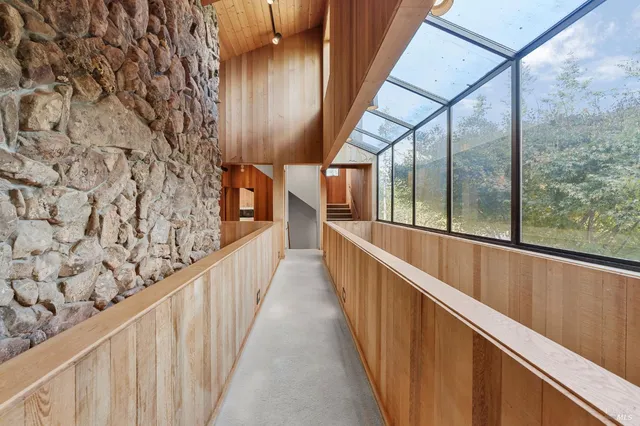 a view of an empty room with a empty space and a window