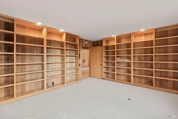 a view of a room that has a window in it