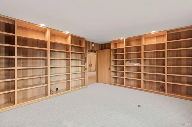 a view of a room that has a window in it