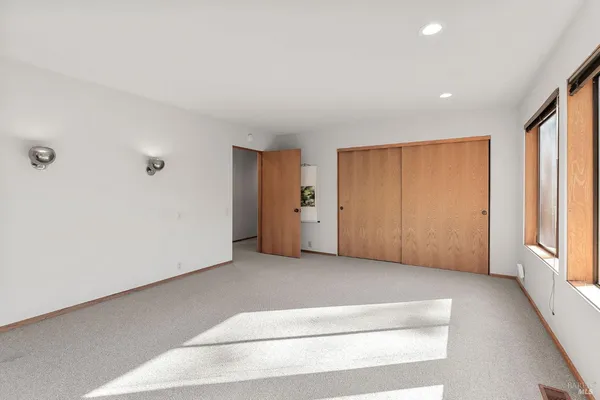 a kitchen with a sink and a refrigerator