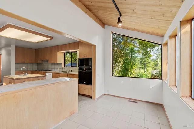 a close view of utility room with mirror