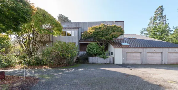 a house view with a garden space