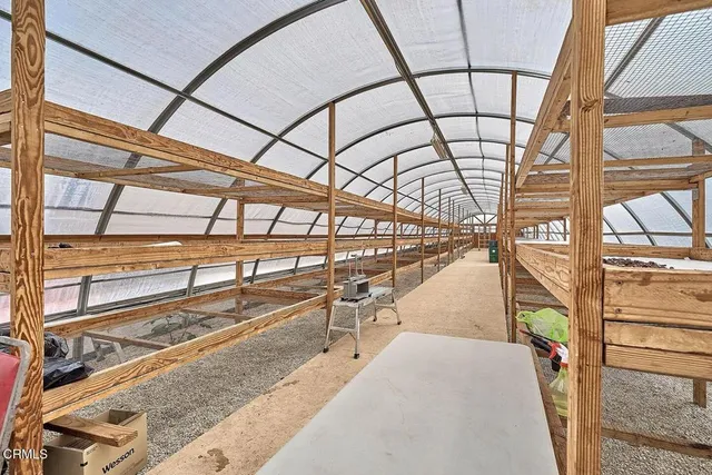a view of a swimming pool with a porch