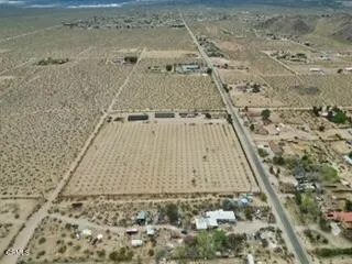 a view of a terrace with chairs