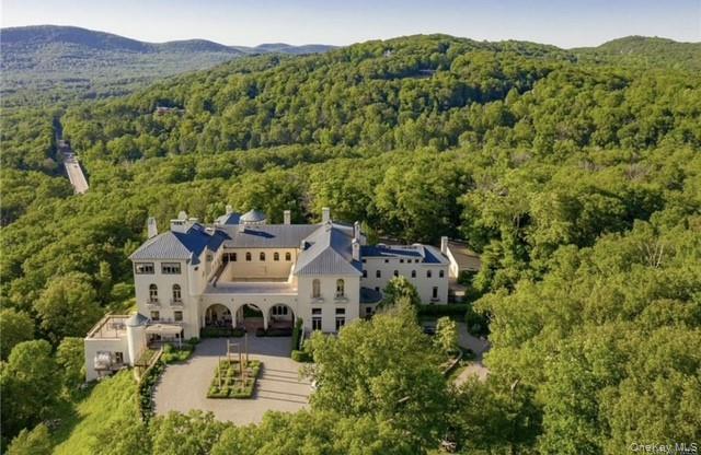 42 Dick's Castle Road Garrison, NY 10524 - Photo 44 of 45 Aerial view of property and surrounding area featuring a forest and mountains