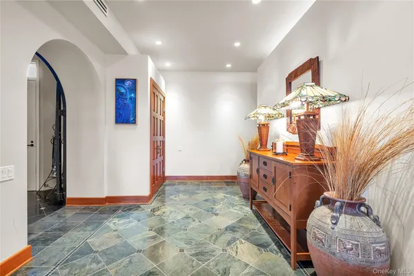 a bathroom with a toilet and a shower curtain