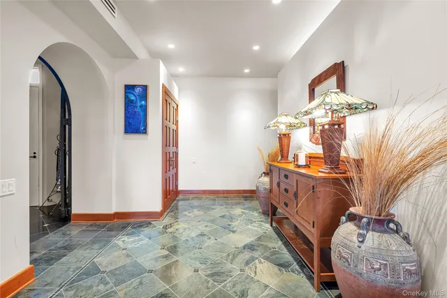a bathroom with a toilet and a shower curtain