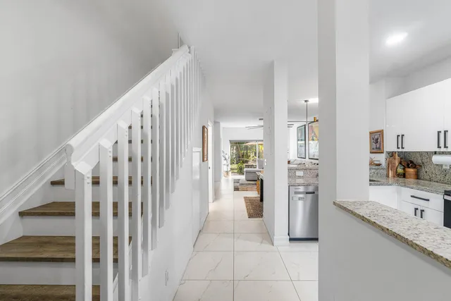 a view of a kitchen with a sink